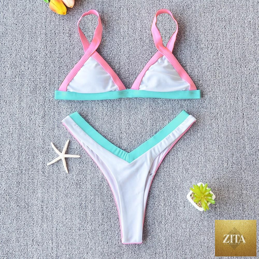 Stevvex solid bikini swimsuit for women featuring a push-up design, patchwork style, high-leg cut, halter top, ideal for beach and swimming.