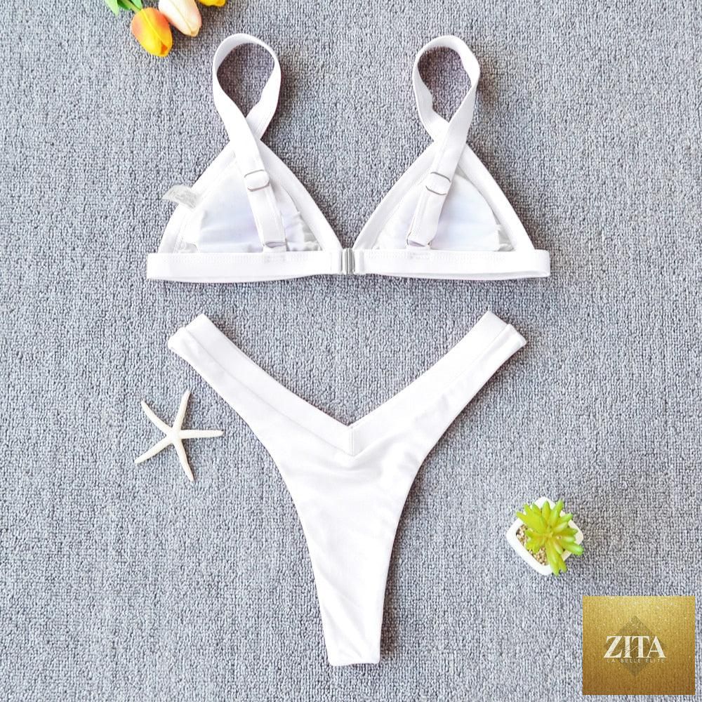 Stevvex solid women’s bikini swimsuit with patchwork design, push-up style, halter neck, high-leg cut, ideal for beach and swimming.