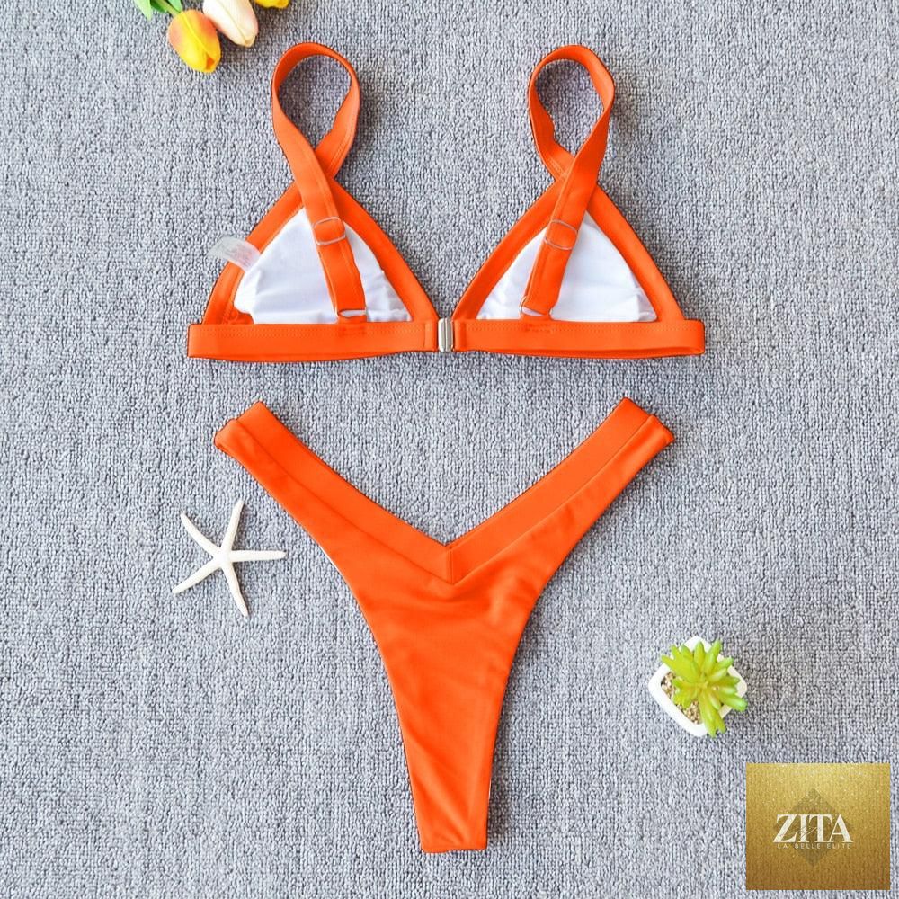 Stevvex solid women's bikini swimsuit with push-up design, patchwork pattern, high-leg cut, halter style, perfect for beach and swimming.