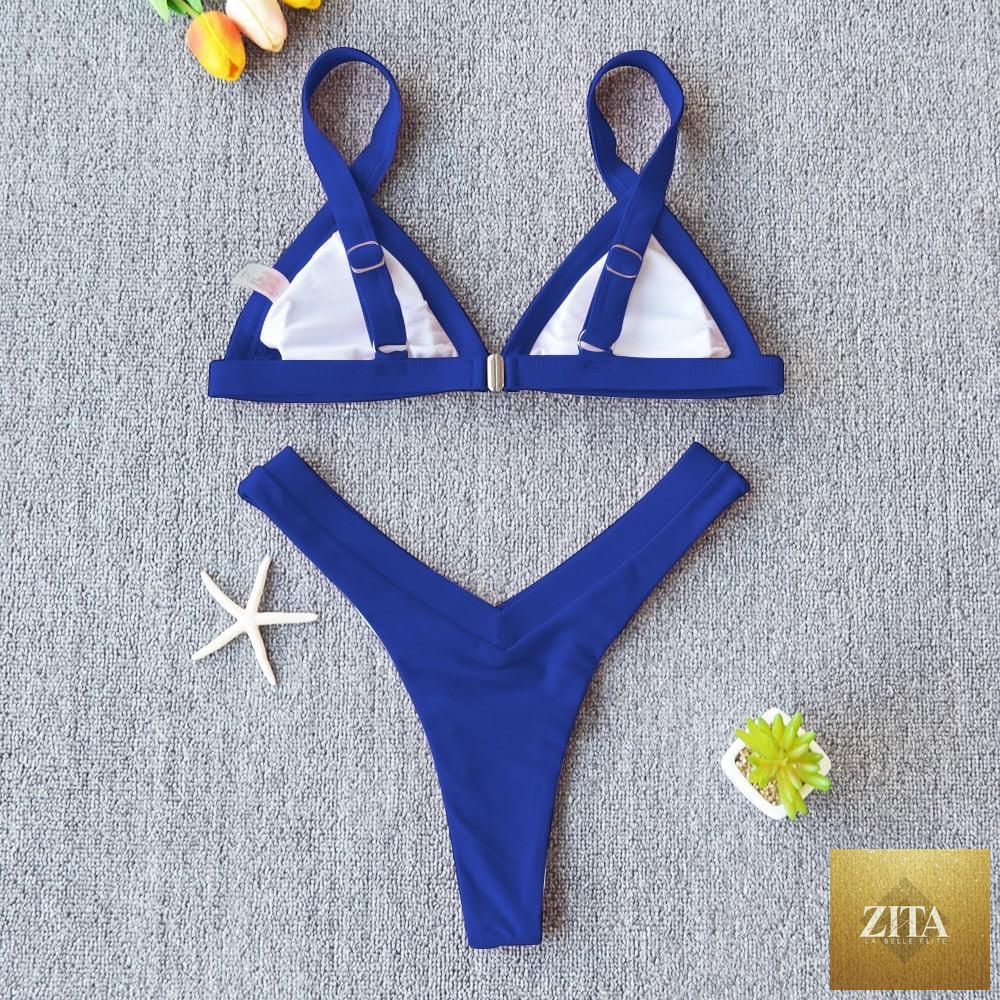 Stevvex solid women's bikini swimsuit with push-up padding, patchwork design, high-leg cut, halter neck, ideal for beach and swimming.
