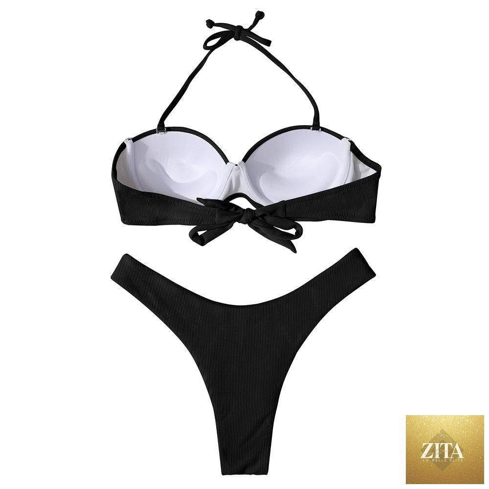 Stevvex leopard bikini set for women, halter triangle top with cheeky bottoms, ideal for summer beachwear and swimming.