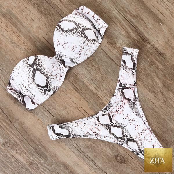 Stevvex leopard bikini set for women, halter triangle top with cheeky bottoms, perfect for summer beachwear and swimming.