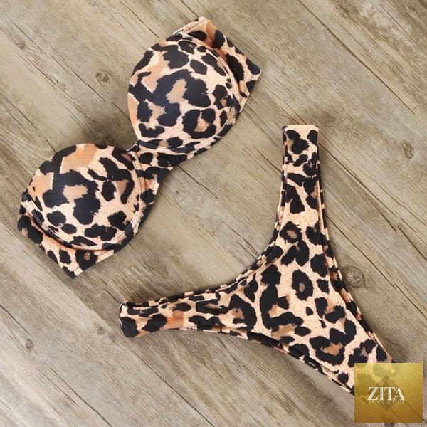 Stevvex leopard bikini set for women, halter triangle top and cheeky bottom, ideal for summer beach wear and swimming.