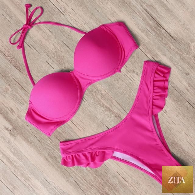 Leopard bikini set for women featuring halter triangle top, cheeky bottoms, and push-up design, ideal for summer beachwear.
