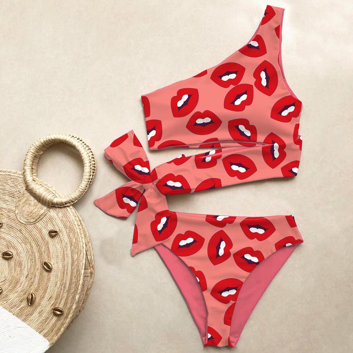 Stevvex one-shoulder women's bikini set featuring a colorful print, high waist, push-up style, lightweight and comfortable for beach swimming.