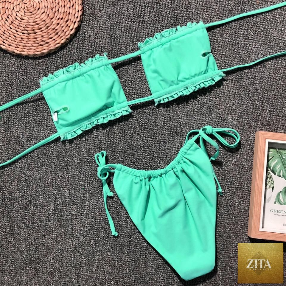 Stevvex women's bikini set with ruffle tie sides, high cut, strapless, padded, solid summer swimwear for beach and pool.