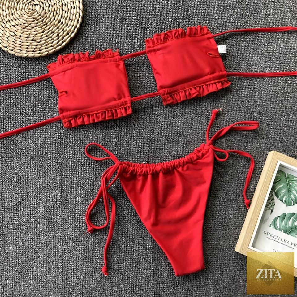 Stevvex women's bikini set with ruffle tie sides, high cut, strapless, padded, solid design for summer beachwear and swimming.