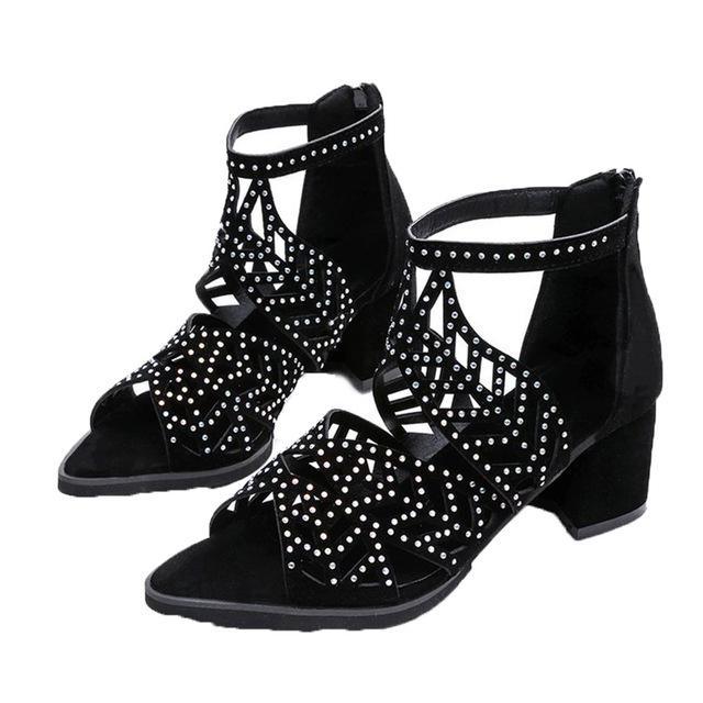 Black Stevvex women’s summer sandals with hollow-out leather, rhinestones, thick heel, zipper, and breathable non-slip design.