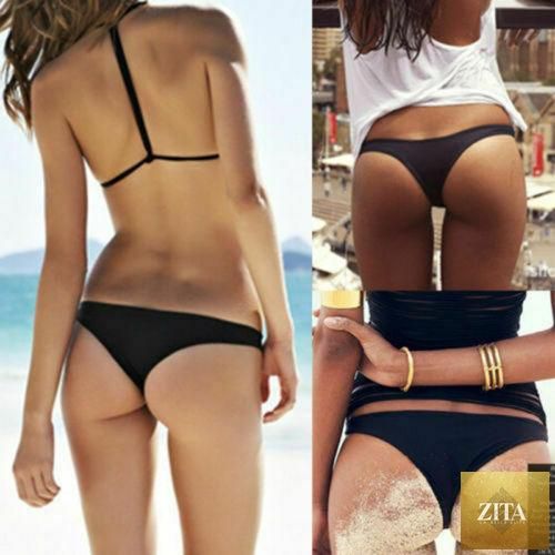 Stevvex black 2-piece women's bandage bikini set with hollow-out design, push-up support, halter style, ideal for beachwear and swimming.