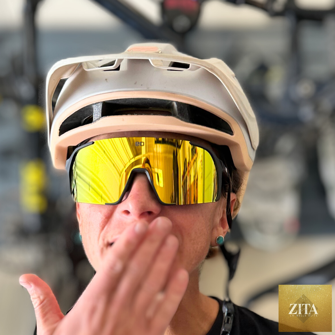 Black Eastern Outer Uno Mas Photochromic+ sunglasses with gold hand logo detail, showcasing stylish eyewear with photochromic lenses.