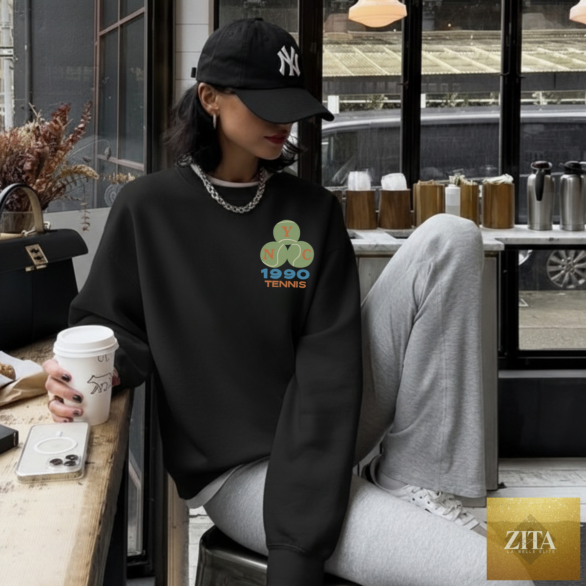 Black NYC 1990 Tennis Crewneck Sweatshirt by Hey Jude Graphic Tees featuring vintage sport graphic and classic tennis-inspired design.