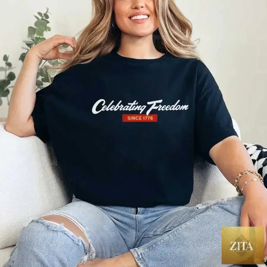 Black 4th of July T-Shirt by Adorb Custom Tees featuring patriotic design celebrating freedom since 1776.