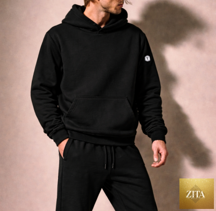 Black men's sweatsuit by Kinetix Casual Luxury, featuring a comfortable hoodie and matching joggers, ideal for casual wear.