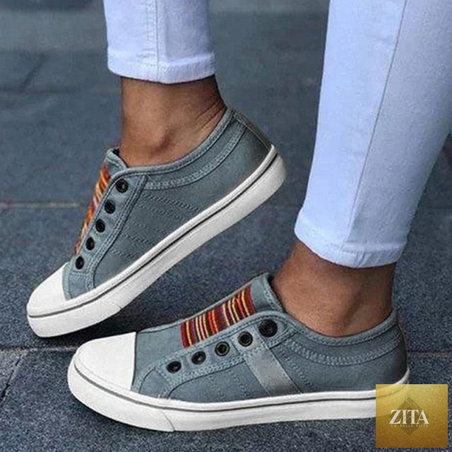 Blue low-cut canvas flat shoes for women by Stevvex, casual slip-on sneakers suitable for summer and autumn walking comfort.