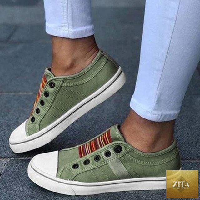 Blue low-cut canvas flat shoes for women by Stevvex, casual slip-on sneakers perfect for summer and autumn walking.