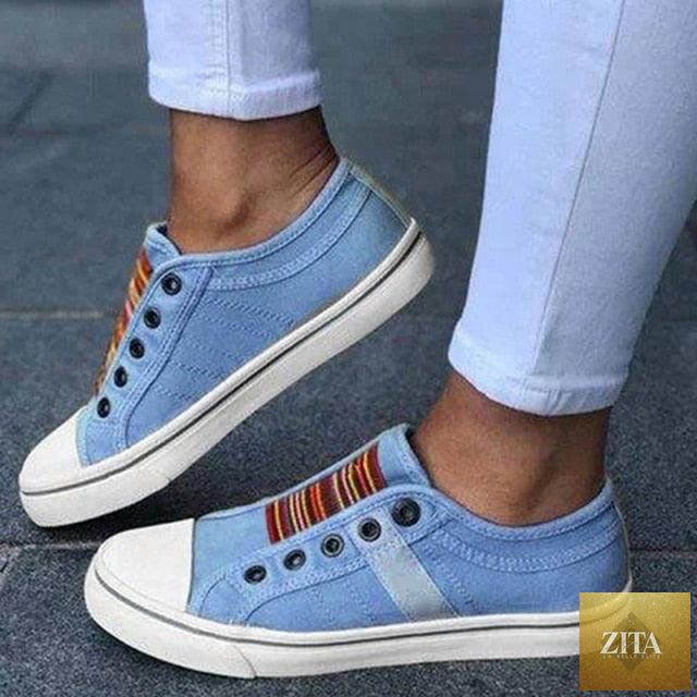 Blue low-cut canvas flats for women by Stevvex, casual slip-on shoes perfect for summer and autumn, comfortable walking sneakers.