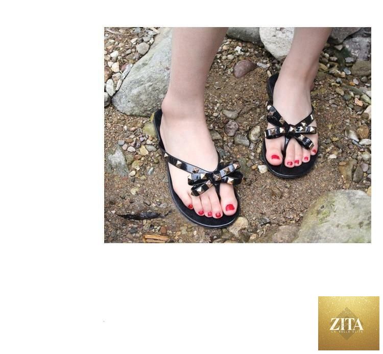 Stevvex women's bowknot summer beach flip flops with PVC slides, slip-on flat sandals, perfect for casual and beachwear.