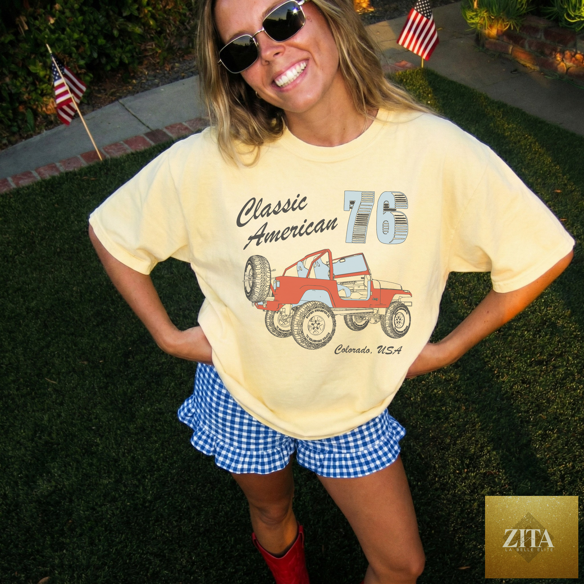 Bright graphic tee featuring a vintage American 76 Jeep design on a classic white t-shirt by Hey Jude Graphic Tees.