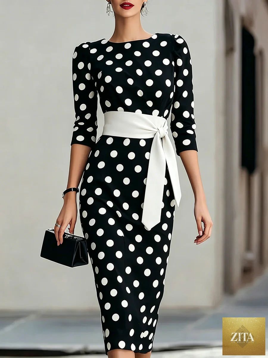 Women's polka-dot bodycon midi dress by Zita La Belle Elite featuring a belted cross-tie design and classic retro style.