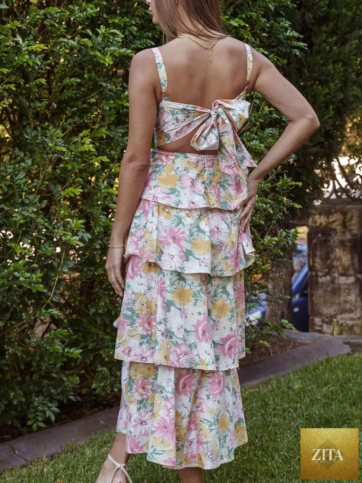 Floral layered ruffle maxi dress from Shopiebay with a flowing skirt and tiered ruffle details, perfect for summer occasions.