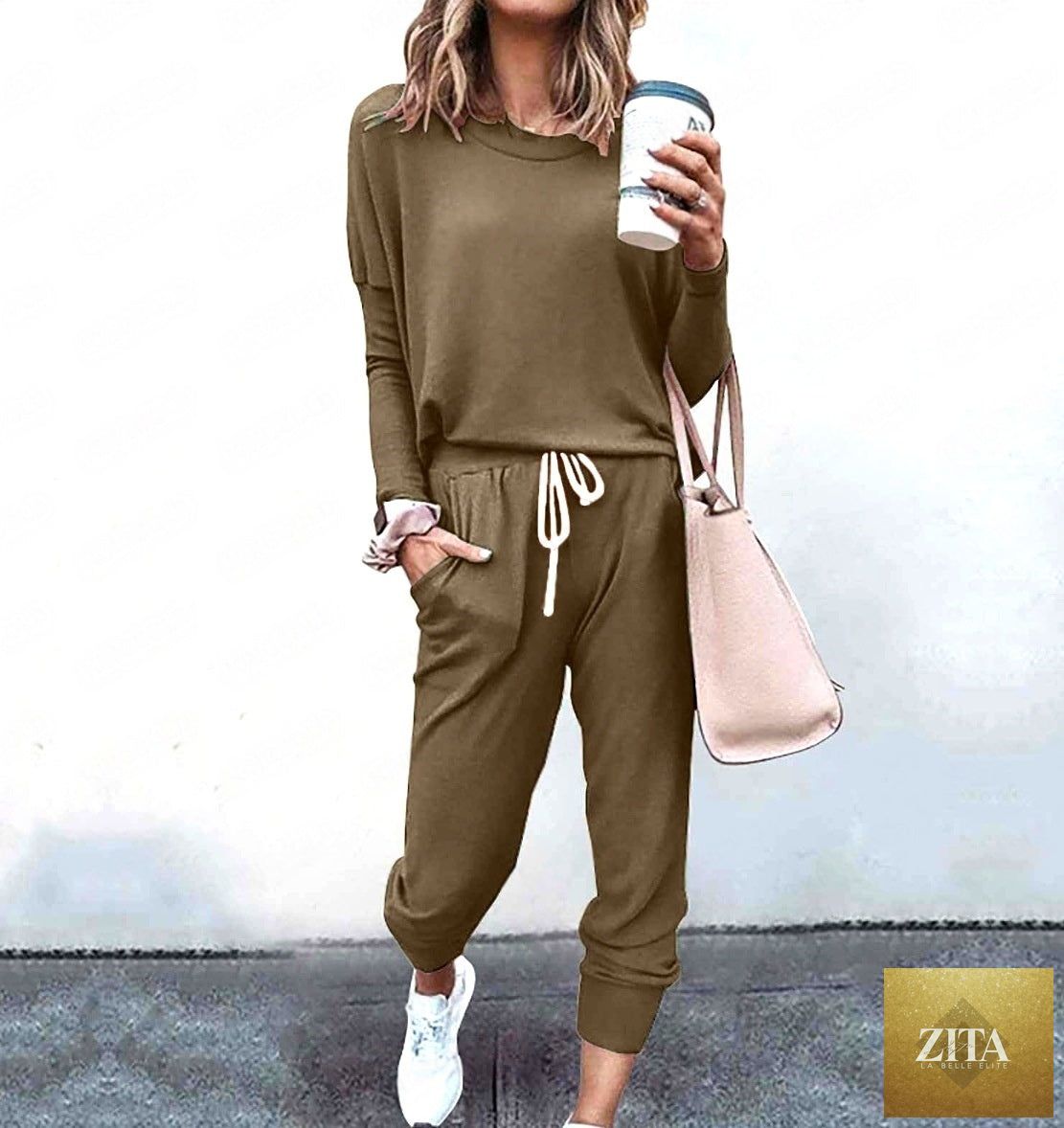 Women's long sleeve t-shirt and pencil pants set by Zita La Belle Elite, featuring a loose fit with striped and solid fabric details.