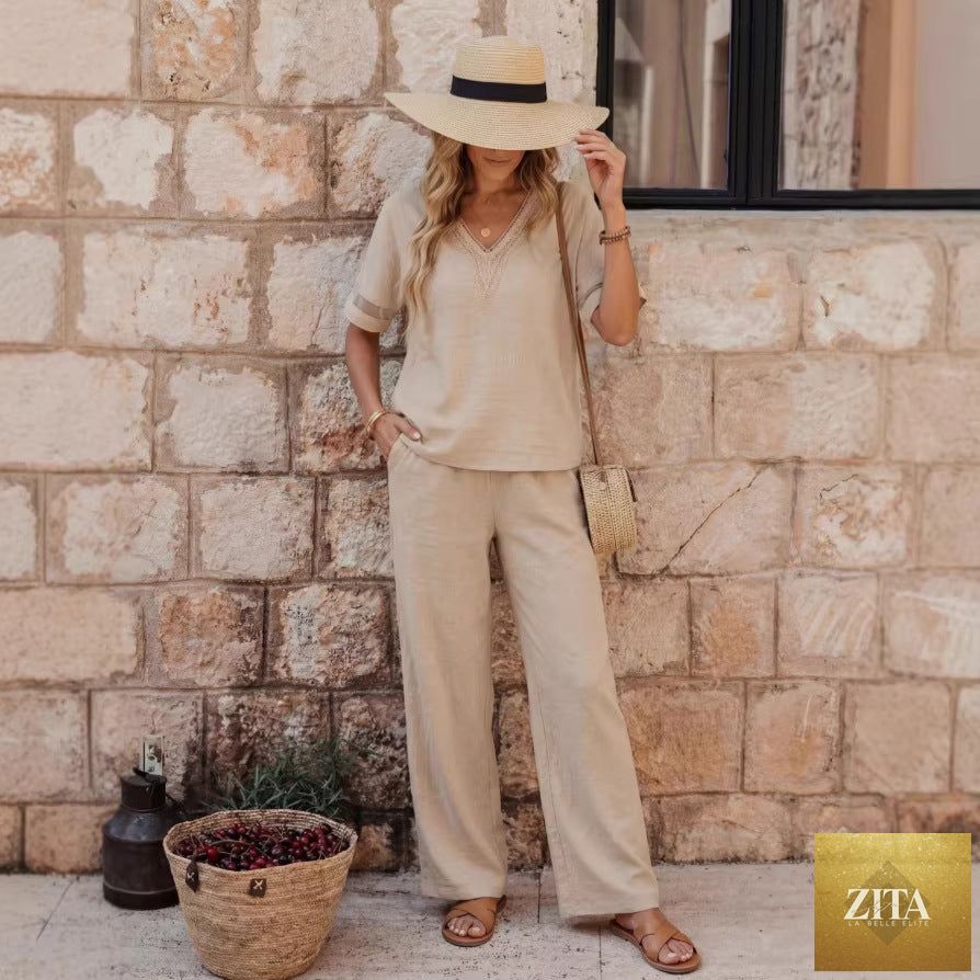 Women's embroidered V-neck top and wide-leg pants set by Zita La Belle Elite, shown in multiple colors, size S to XXL.