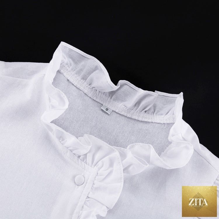 Zita La Belle Elite women's ruffled linen-blend cropped blouse and matching shorts set, stylish and lightweight for warm weather.