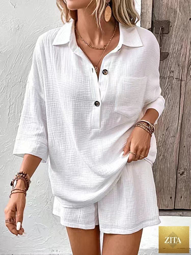 Women's casual two-piece set from Zita La Belle Elite featuring a lapel collar double-panel shirt and matching shorts.