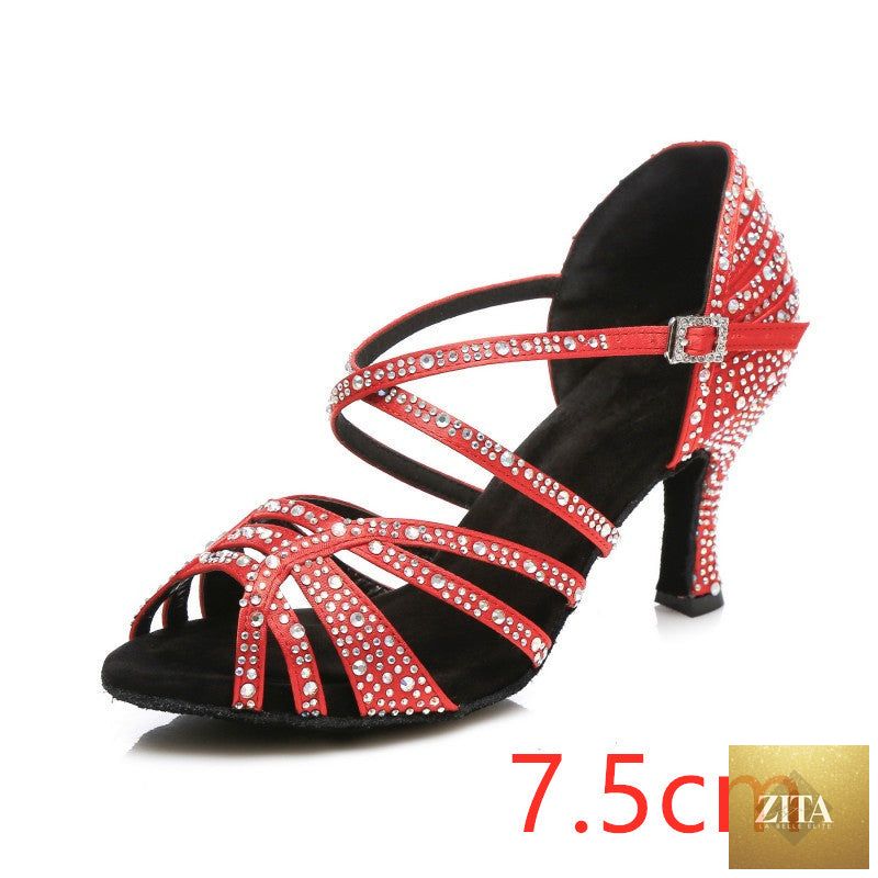 Silver high-heeled Latin dance shoes with straps and open toe, designed for elegant dance performances.