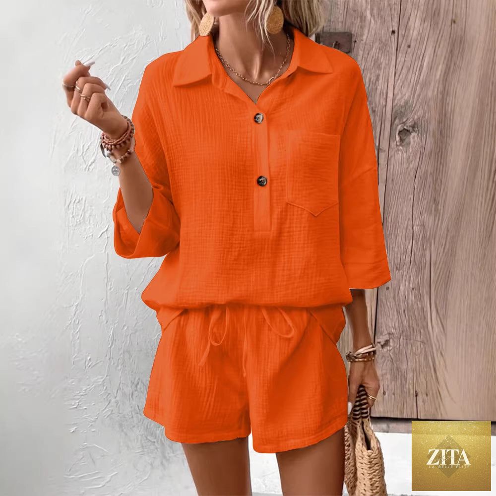 Women's casual two-piece set with a lapel collar shirt and matching shorts by Zita La Belle Elite, displayed on a hanger.