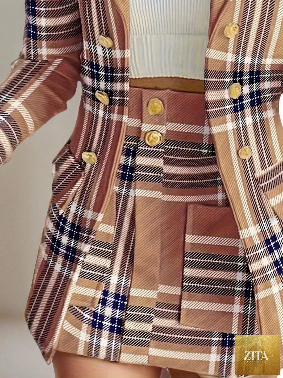 Women’s elegant plaid skirt suit set by FitiqueFit, featuring a stylish casualwear ensemble with a fitted blazer and matching skirt.