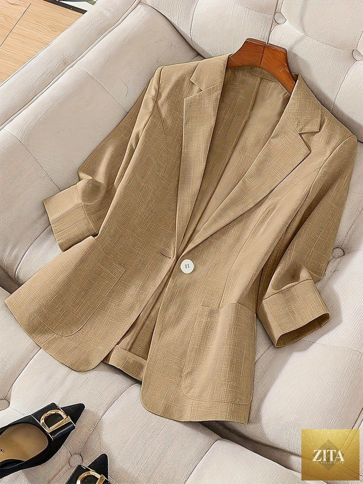Women's casual blazer with three-quarter sleeves and single-button design from Zita La Belle Elite, shown in a fitted style.