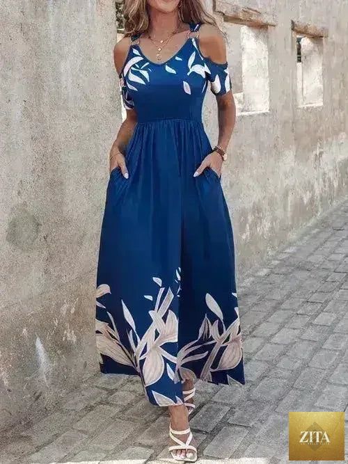 Femstylo printed cold shoulder maxi dress in stylish polyester fabric, featuring a flowy silhouette and fashionable design.