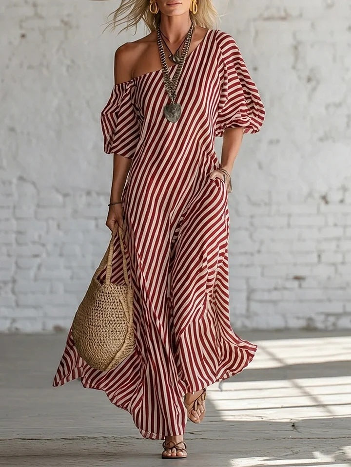 Women's striped off-shoulder midi dress by FitiqueFit, elegant and stylish activewear with a fitted design and bold stripe pattern.