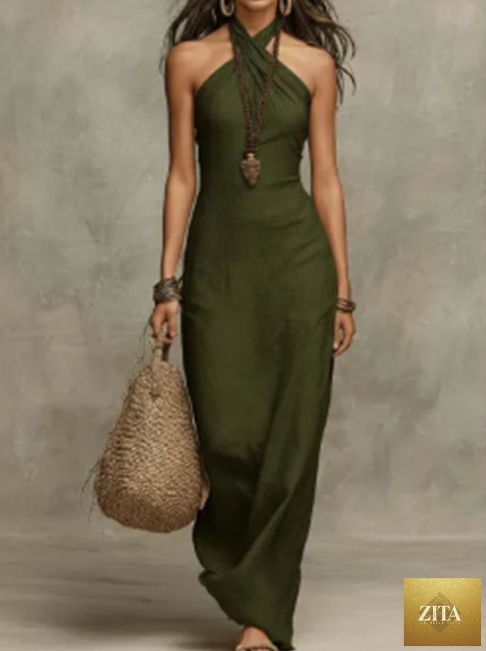 Plus size women's casual jumpsuit in solid color, relaxed fit, from Zita La Belle Elite, shown on a model in a natural pose.