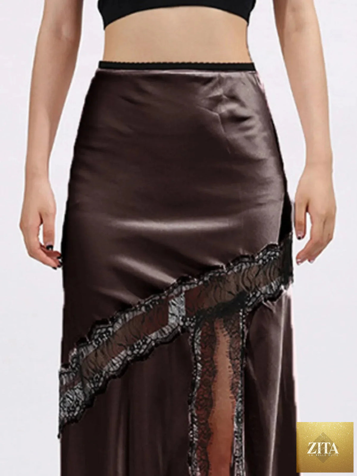 Zita La Belle Elite lace trim asymmetrical midi skirt showing flowing fabric and detailed lace accents.