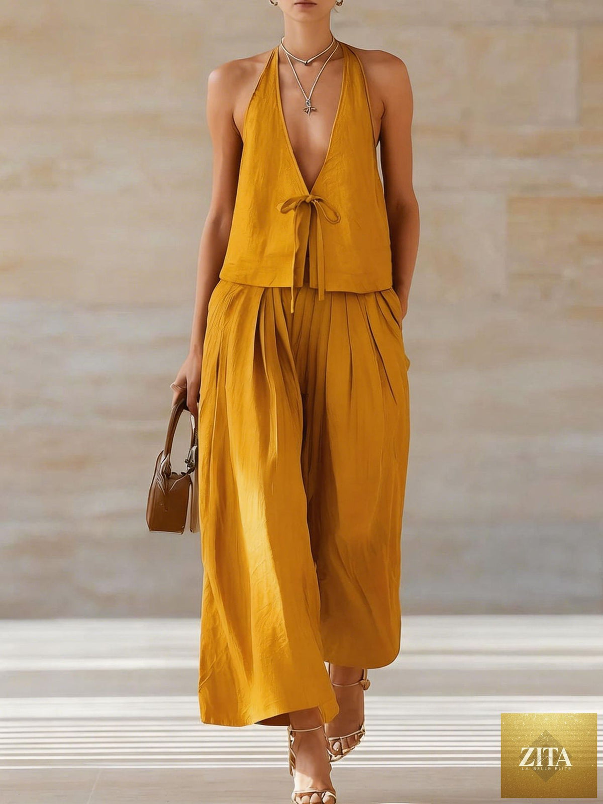 Zita La Belle Elite women's sleeveless vest and wide-leg pants casualwear set with lace-up details, stylish and comfortable outfit.