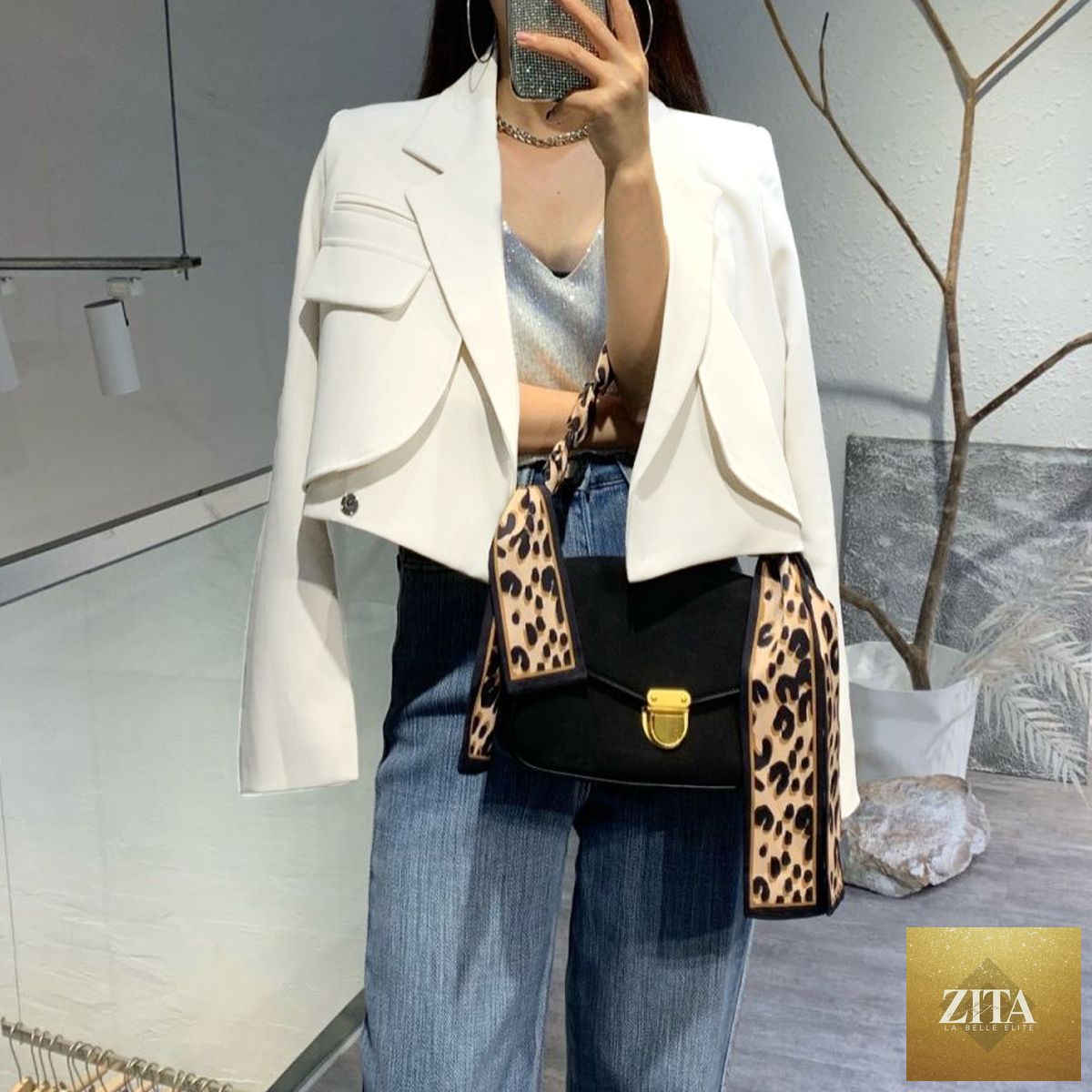 Elegant women's short blazer by Social Buzz eSIMs, versatile blazer with tailored fit and stylish design for professional or casual wear.