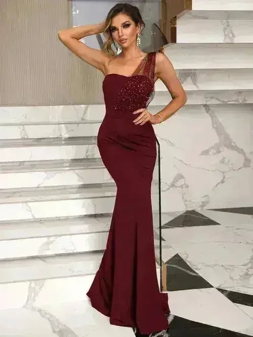 Femstylo women's rhinestone one-shoulder formal evening gown with elegant design and sparkling embellishments.