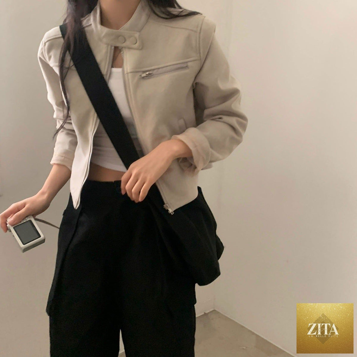 High waist suede motorcycle top jacket with short length and stylish design, perfect for edgy fashion looks.