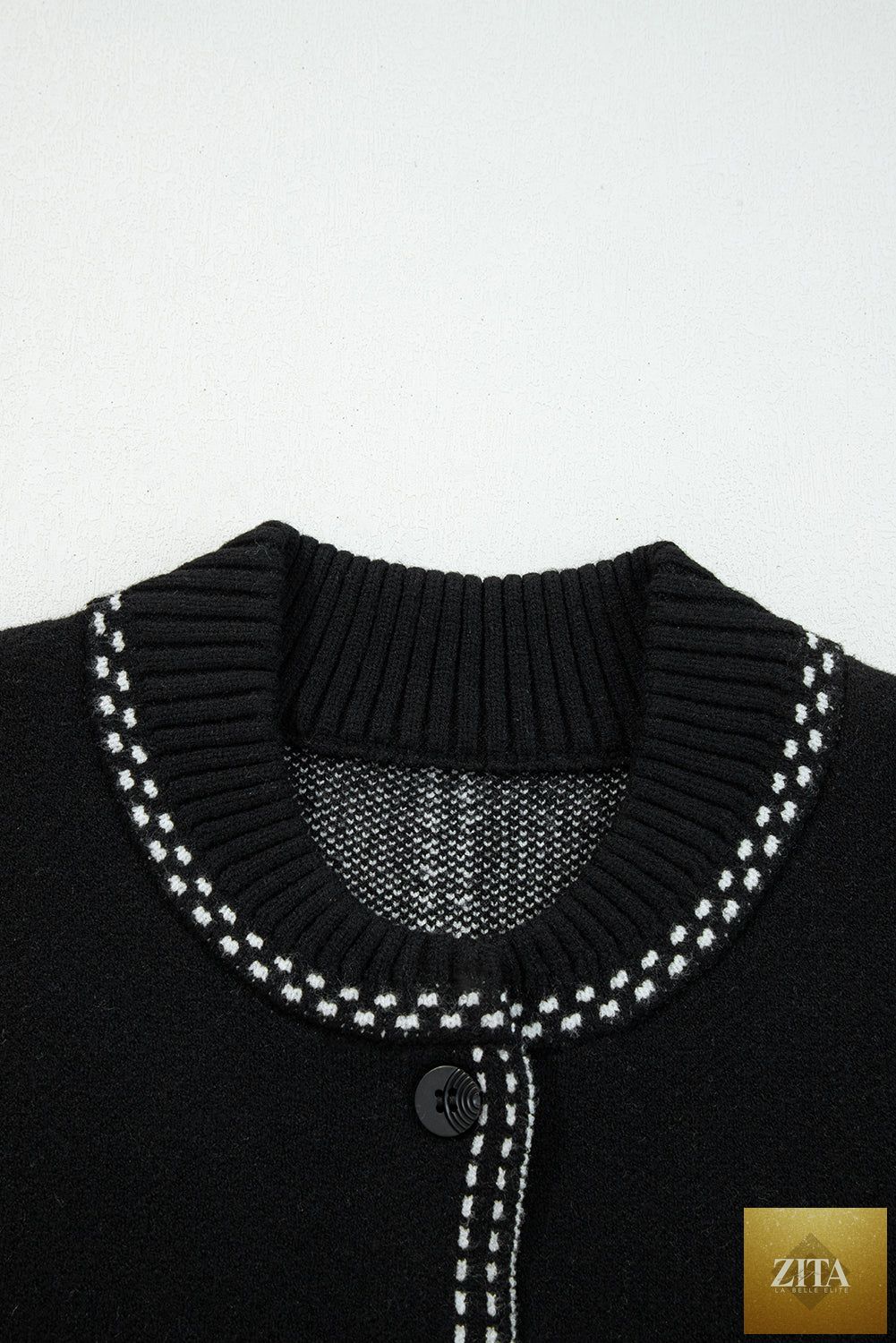 Black contrast trim button-up sweater cardigan from Wild and Free Boutique, featuring a classic fit with stylish detailing.