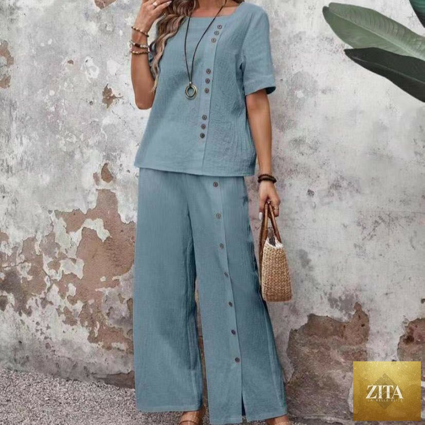 Women’s linen casualwear set by Zita La Belle Elite featuring a button-up top and loose fit two-piece linen outfit.