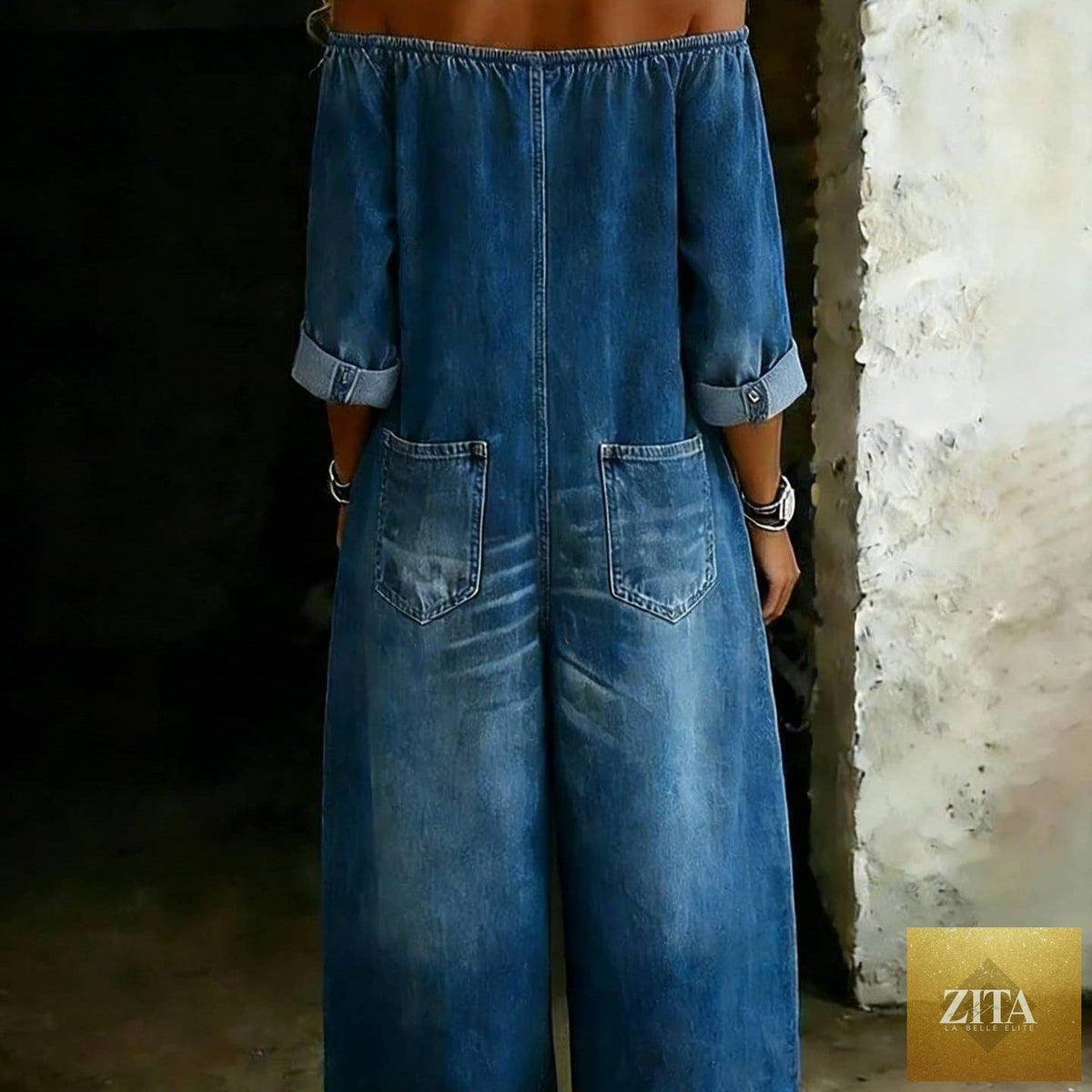 Women's off-shoulder washed faux denim strap overalls jumpsuit by Zita La Belle Elite, casualwear with a relaxed fit and stylish design.
