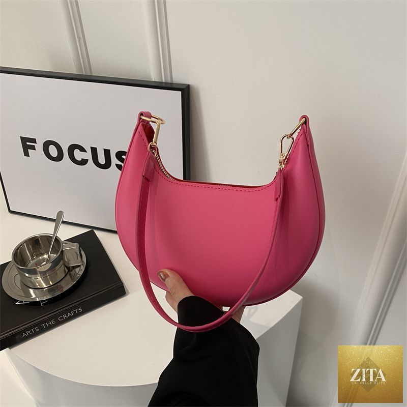 Textured shoulder bag for women featuring a simple, versatile design from Niche Crescent New, by Social Buzz eSIMs.