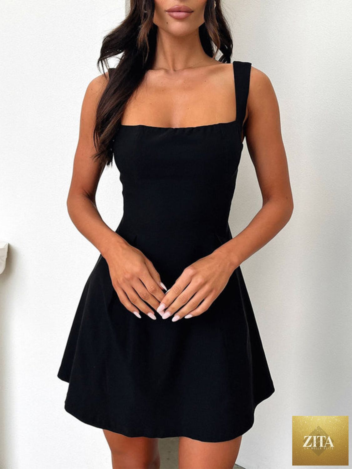 Dark blue Stevvex mini dress with bow back and square neckline, feminine and flattering, perfect for girls' stylish occasions.