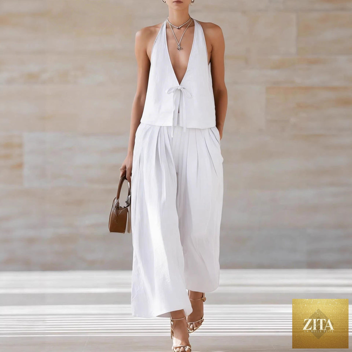 Women's sleeveless vest and wide-leg pants set by Zita La Belle Elite, casual lace-up 2-piece outfit with stylish, comfortable fit.