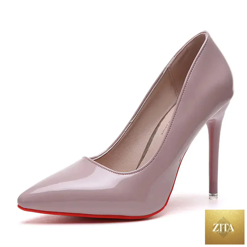 Elegant women's pointed toe high heels from Trendy Attic Store01, showcasing sleek black shoe with stiletto heel.