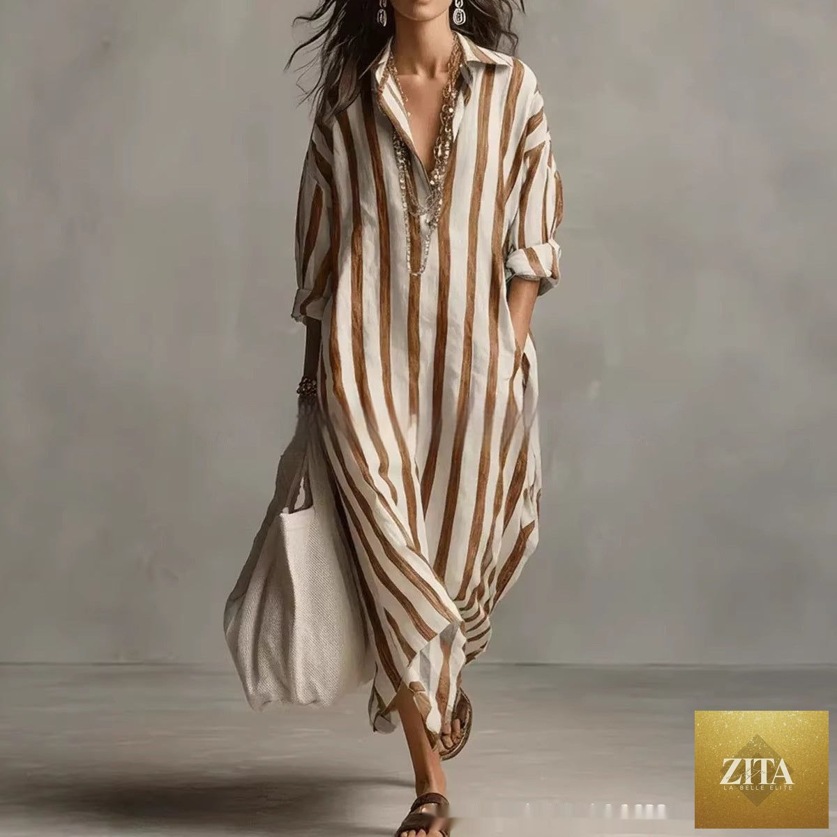 Zita La Belle Elite striped dress with lapel collar, side slits, and pockets, displayed on a hanger against a neutral background.
