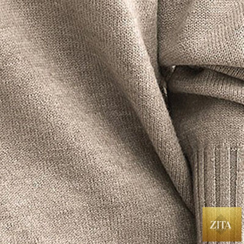 Women’s V-neck drop shoulder sweater by FitiqueFit, casual long sleeve pullover with a relaxed fit and cozy knit texture.