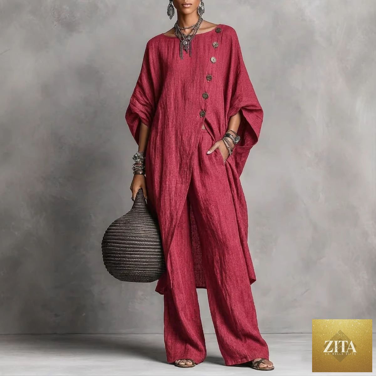Women's casual drop shoulder three-quarter sleeve irregular shirt and pants set by Zita La Belle Elite, shown on a model.